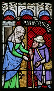 Vetrata raffigurante le Opere di Misericordia: Accoglienza dello Straniero da French School